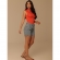 Short jeans com pala frontal